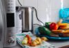 photo of vegetables beside gray electric kettle